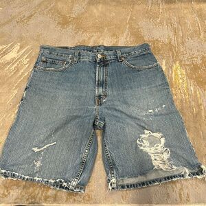 VTG Levi’s 550 distressed shorts light blue made in Mexico